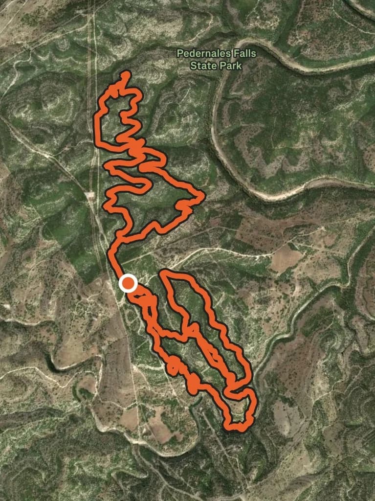 Satellite map of the looping 100 km route beside Pedernales Falls State Park.