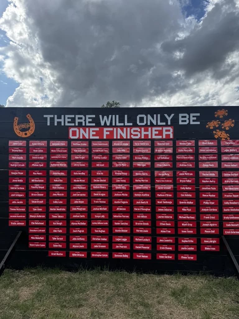 The race's wall of runner name tags under the words “There will only be one finisher,” Dylan’s among them.